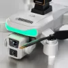 A white drone with black propellers and green light strips, including a handheld remote control and real-time display on a mobile phone Application Scenario